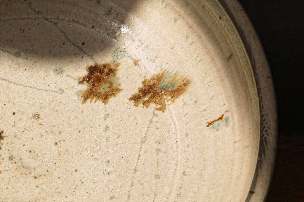 Hollow stoneware dish, signed Yves Loiselet