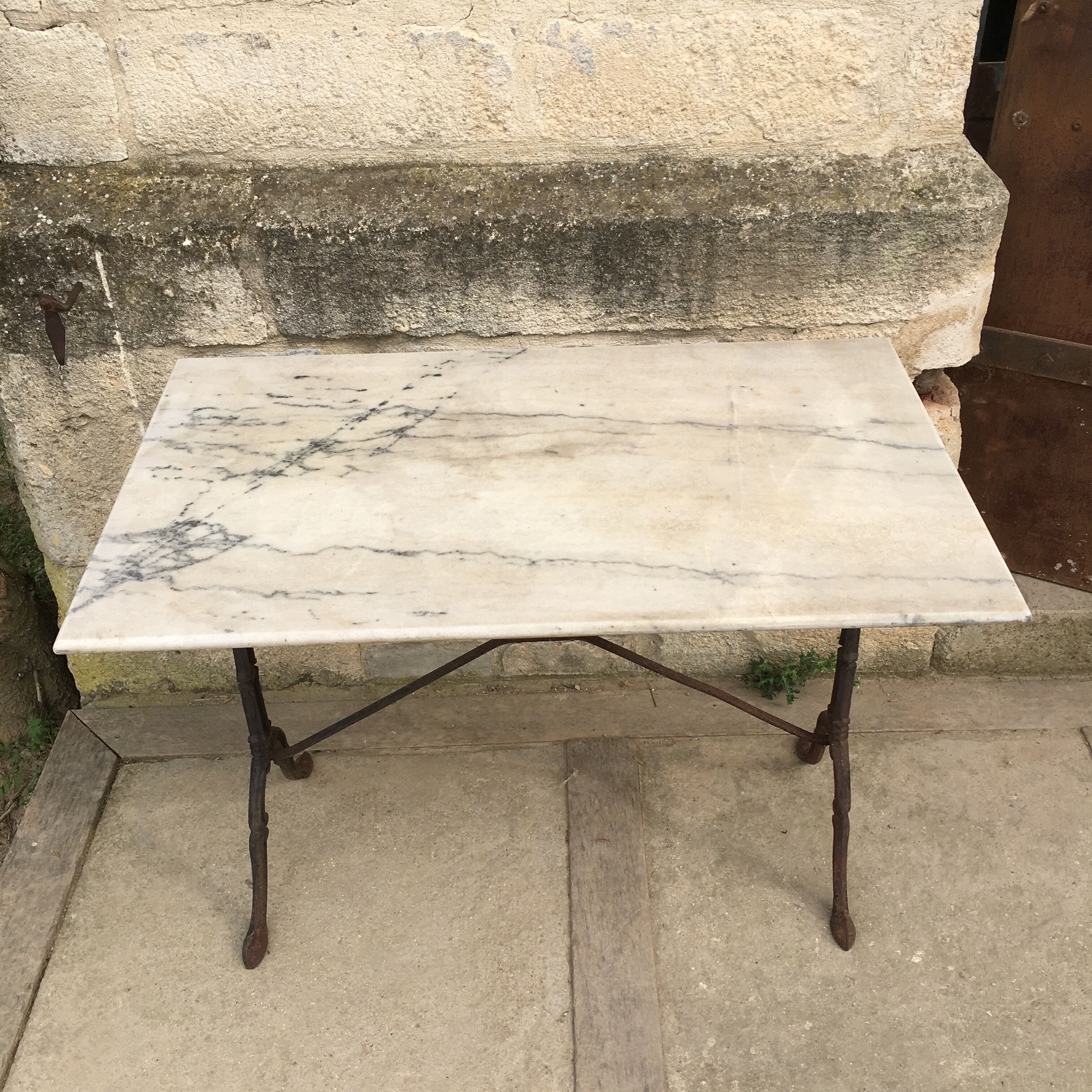 Cast and marble bistro table