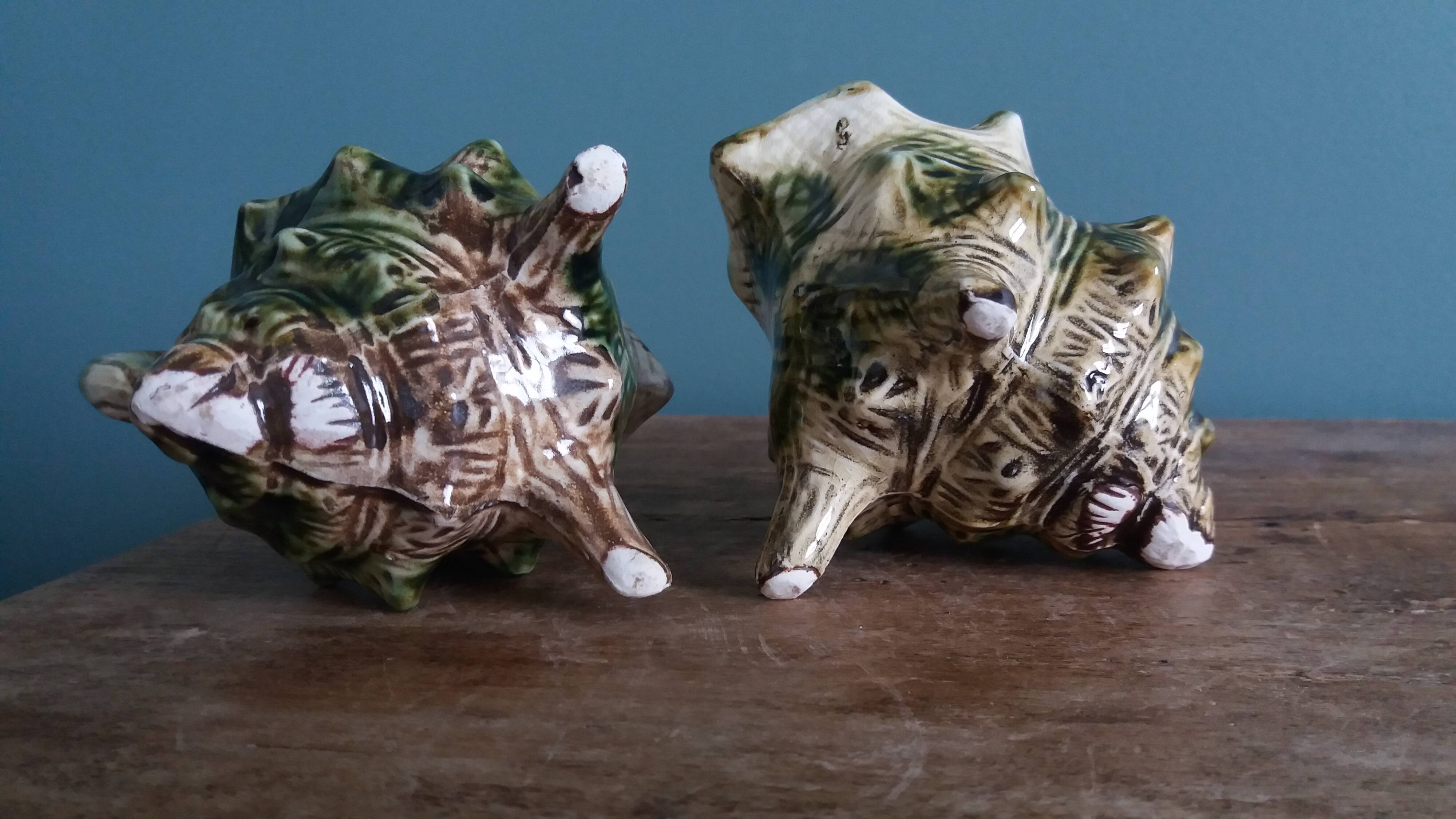 Animal-shaped milk jug shell in slipware.