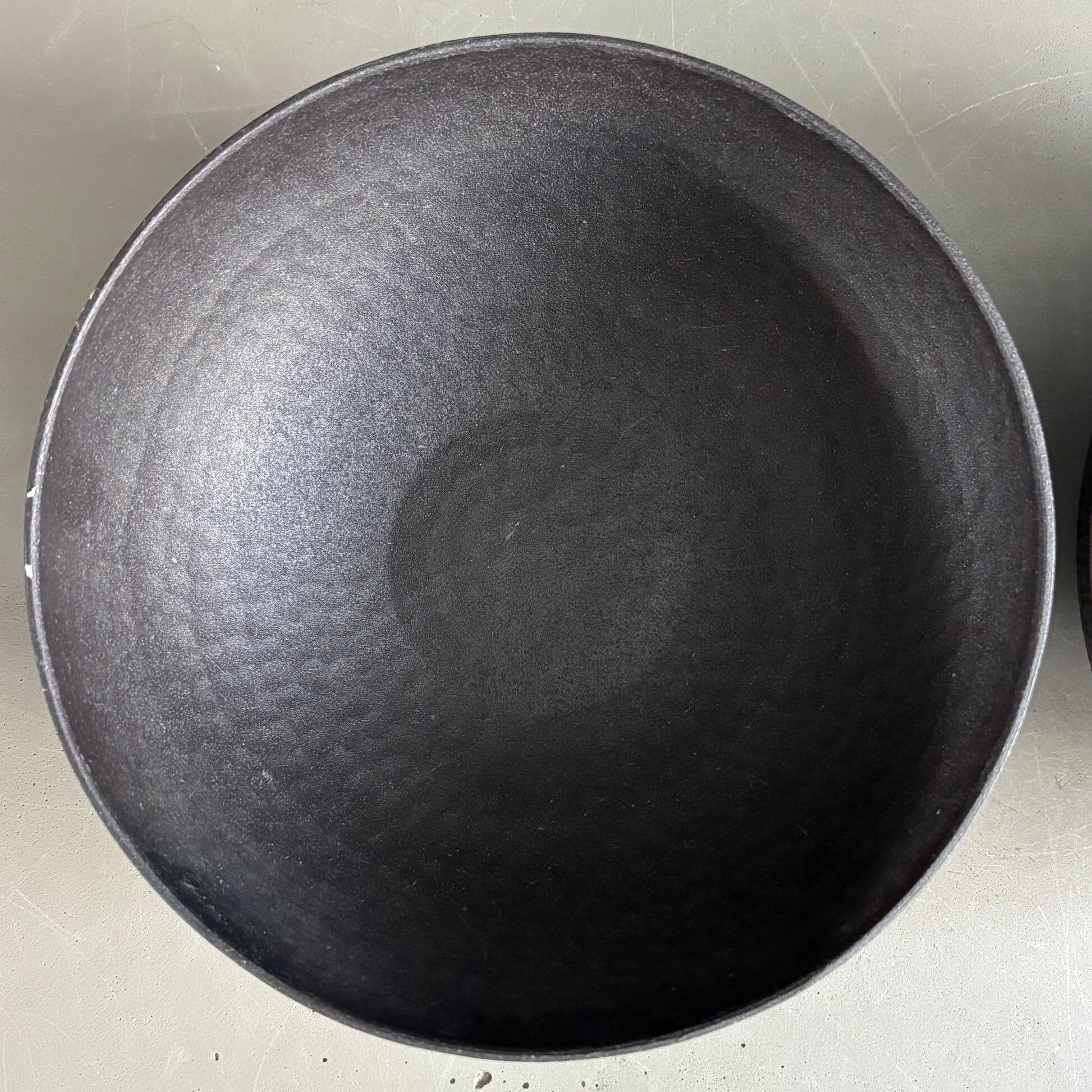Pair of black lacquered metal catchall bowls