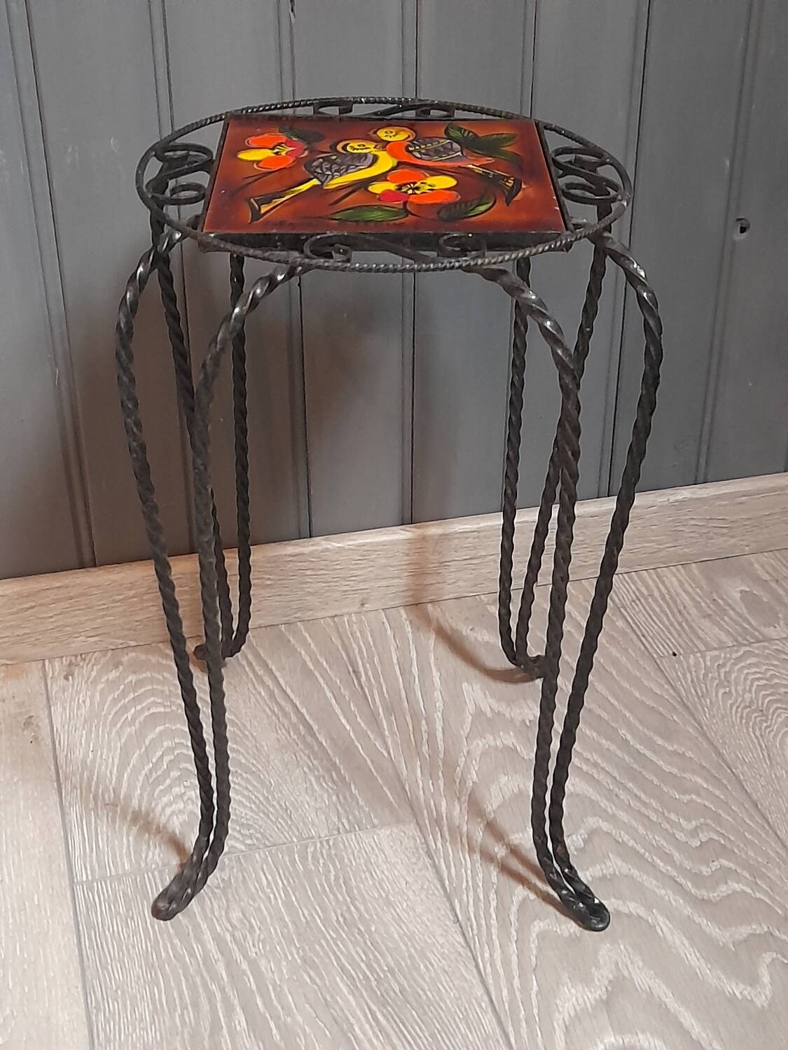 Wrought iron stool and Vallauris pottery signed Leduc.