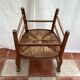 Light wood armchair seated in vintage straw dimension: height -78cm- width -54cm-