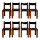 Pierre Chapo. Series of 8 "S11" chairs in elm and leather. 1960s-70s.