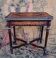 Game table in marquetry.
