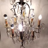 Neoclassical bronze chandelier with 8 lights, tassels and dagger