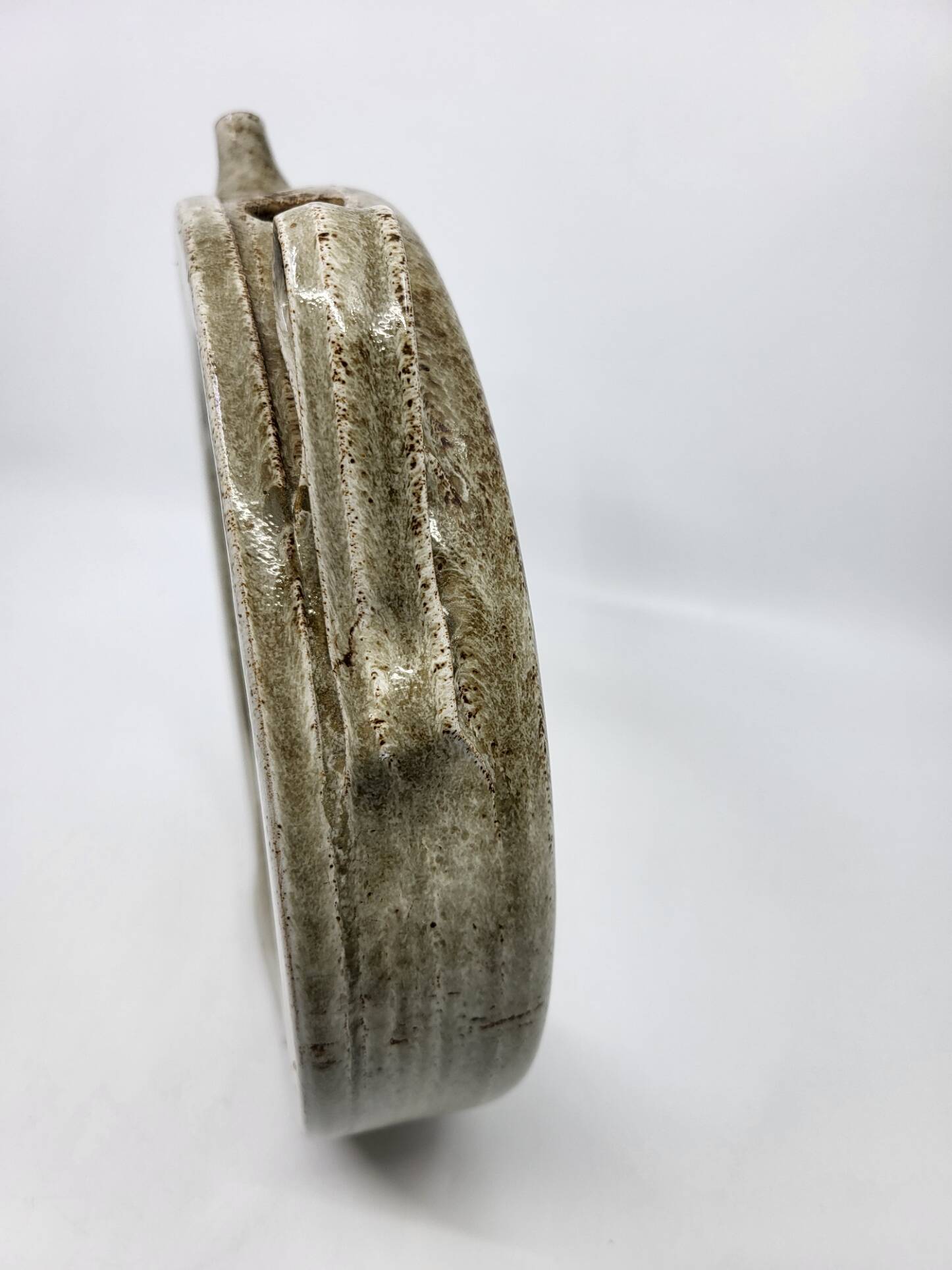Vintage glazed stoneware pitcher in sculptural ring shape (1970s)