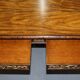 Double-sided writing desk in hardwood with gilt griffins, RJ Horner style.