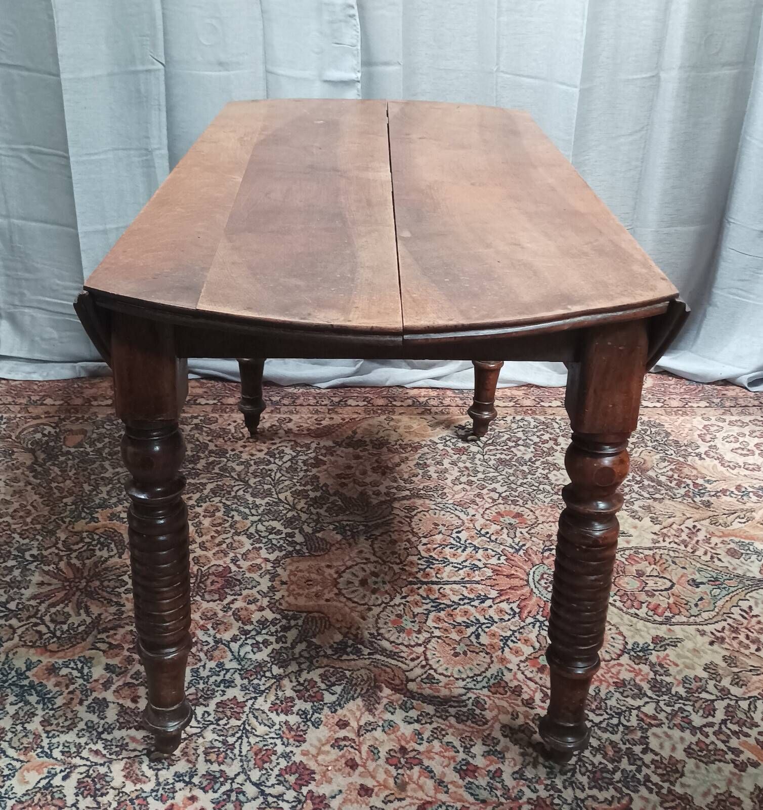 19th-century Louis Philippe walnut drop-leaf table.
