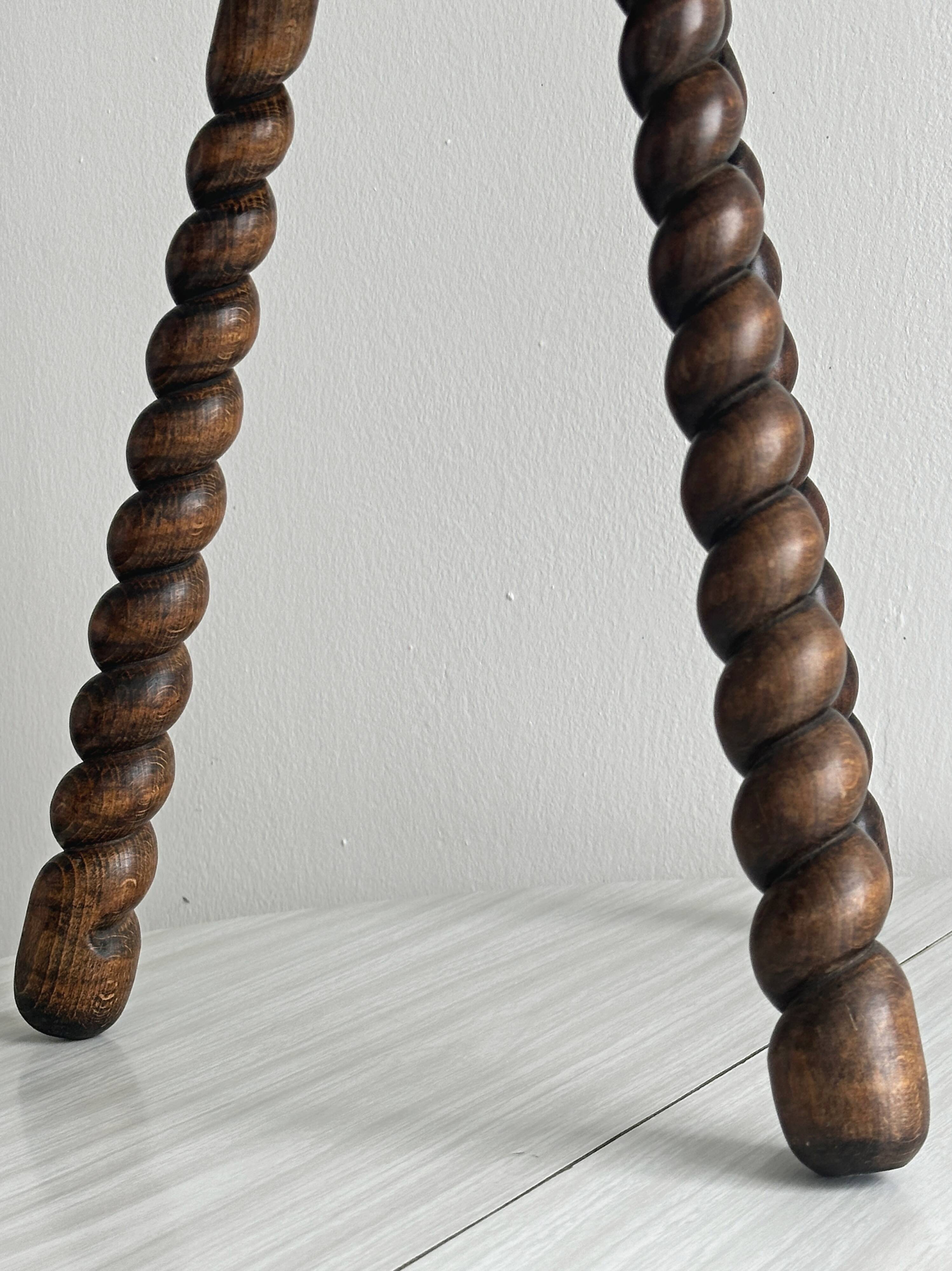 Antique turned wooden tripod stool