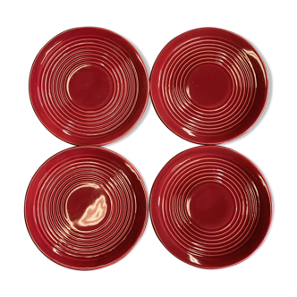 Set of 4 plates of red enamelled earthenware bread 1950
