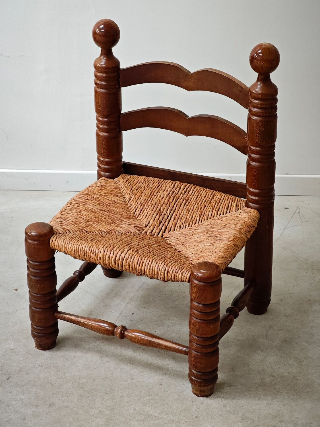 Small Charles Dudouyt chair in wood and straw