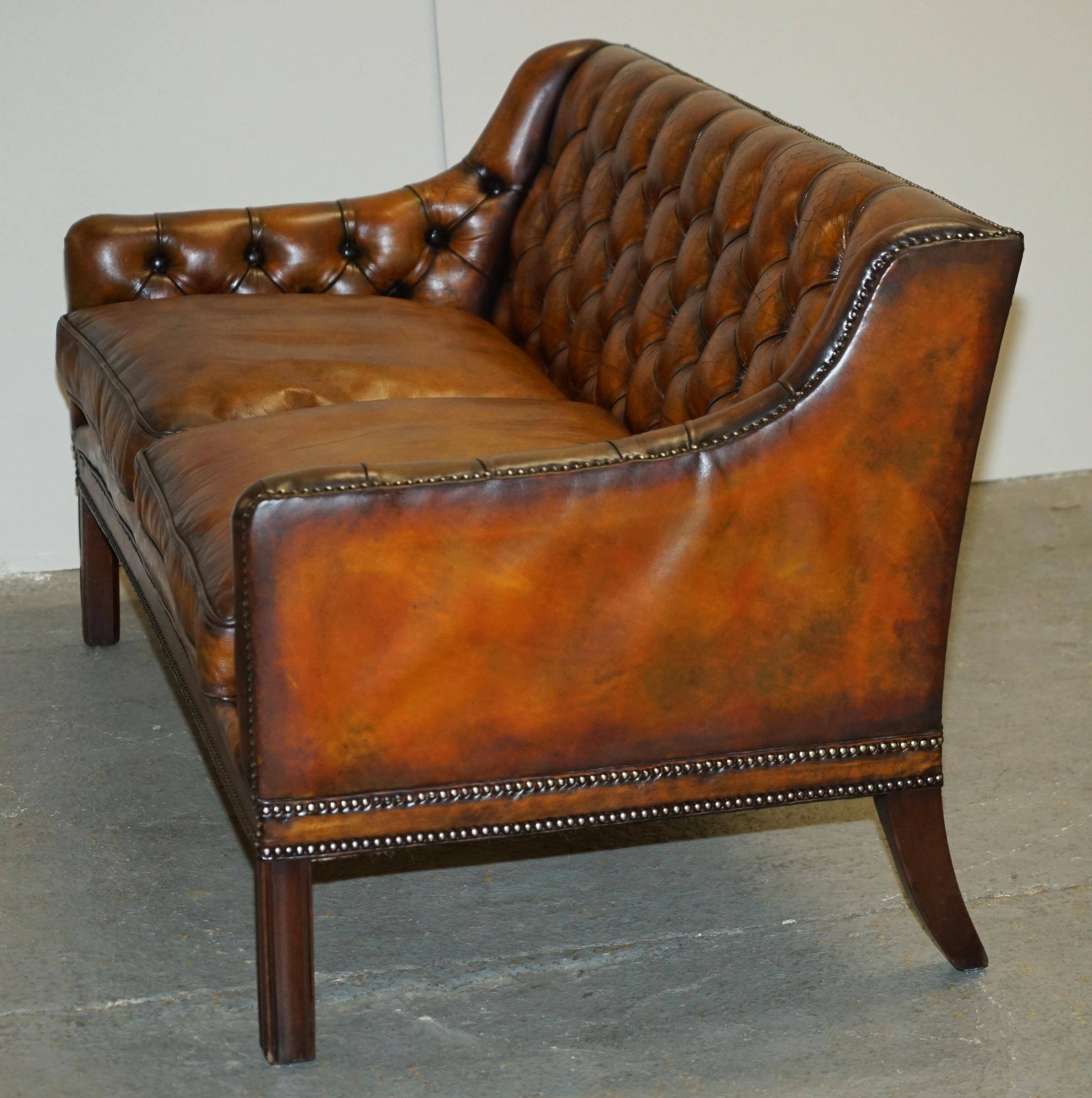 Restored leather Chesterfield sofa in Regency style