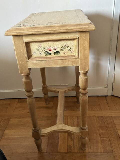 exotic wood console with a drawer