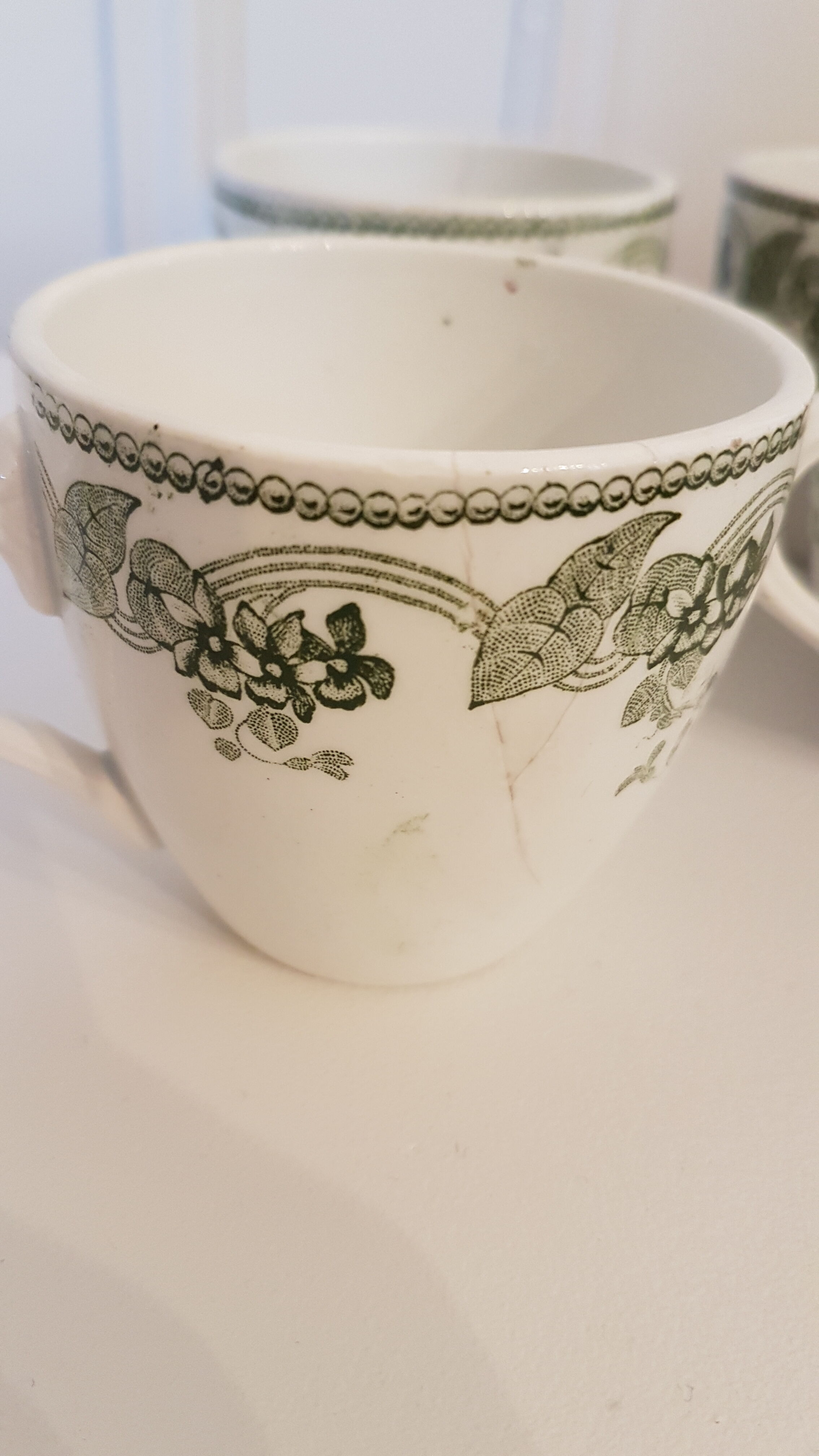 Set of 11 porcelain cups