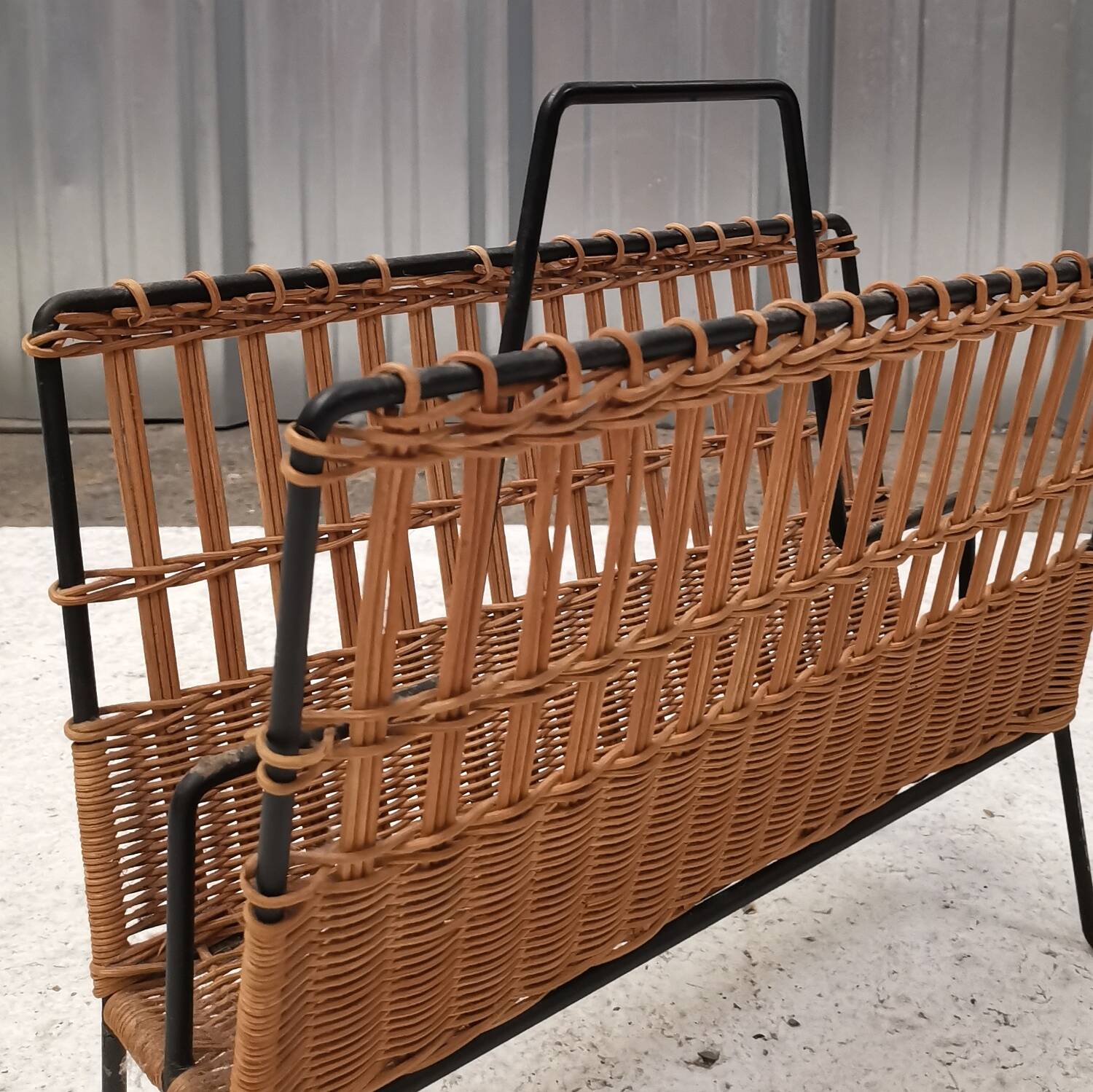 Vintage rattan and metal magazine rack, Raoul Guys