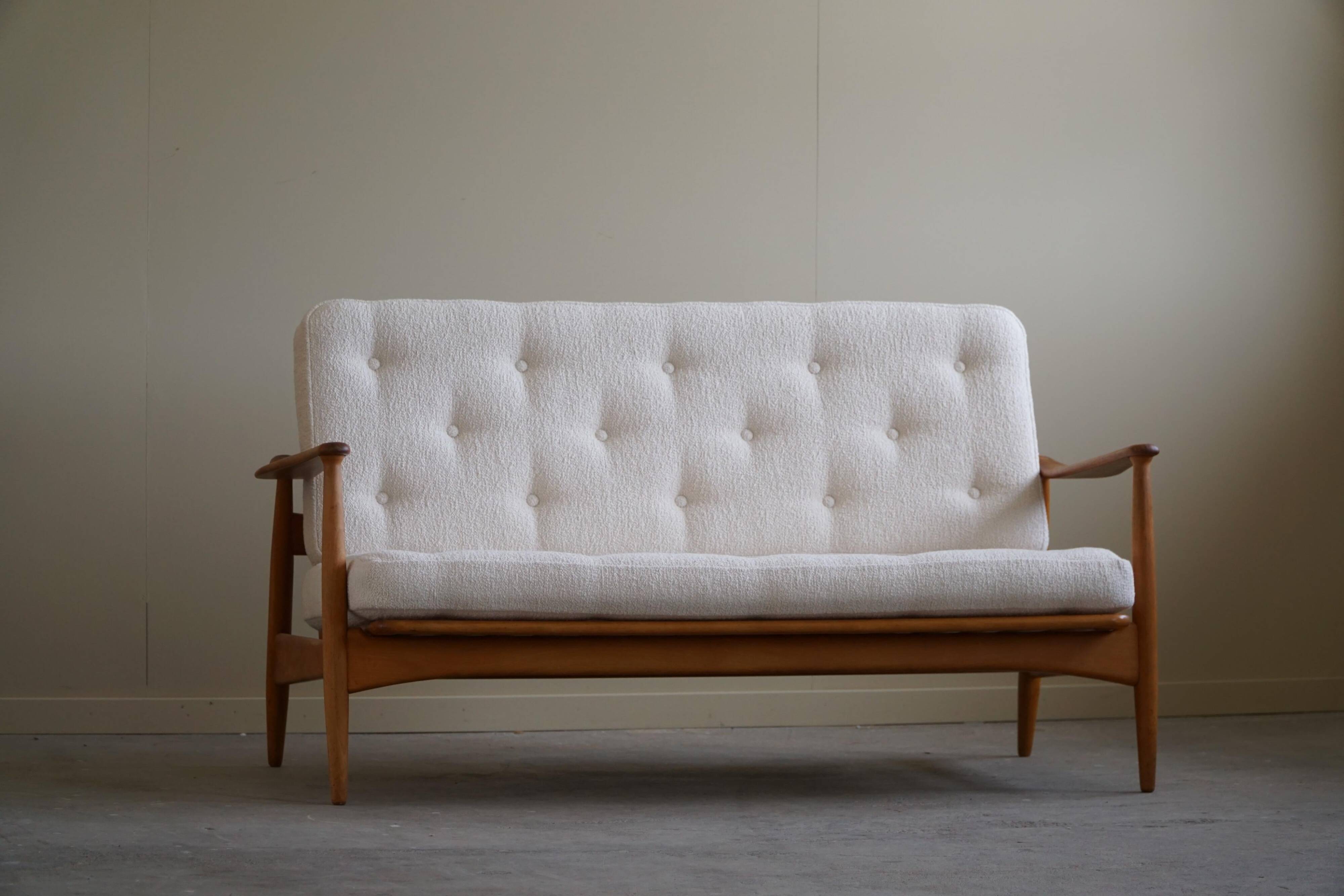 Two-seater canapé Arne Vodder, model Fd 161, reupholstered in boucle, 1950s.