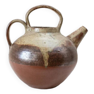 Old sandstone water pitcher.