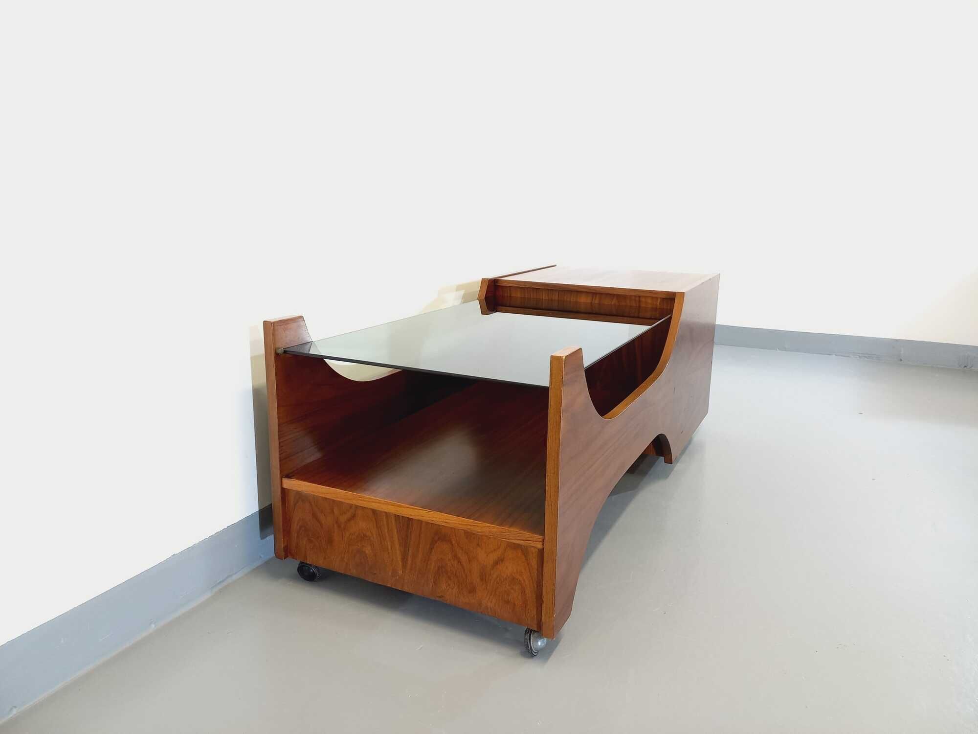 Vintage bar coffee table on rosewood wheels and smoked glass from the 60s