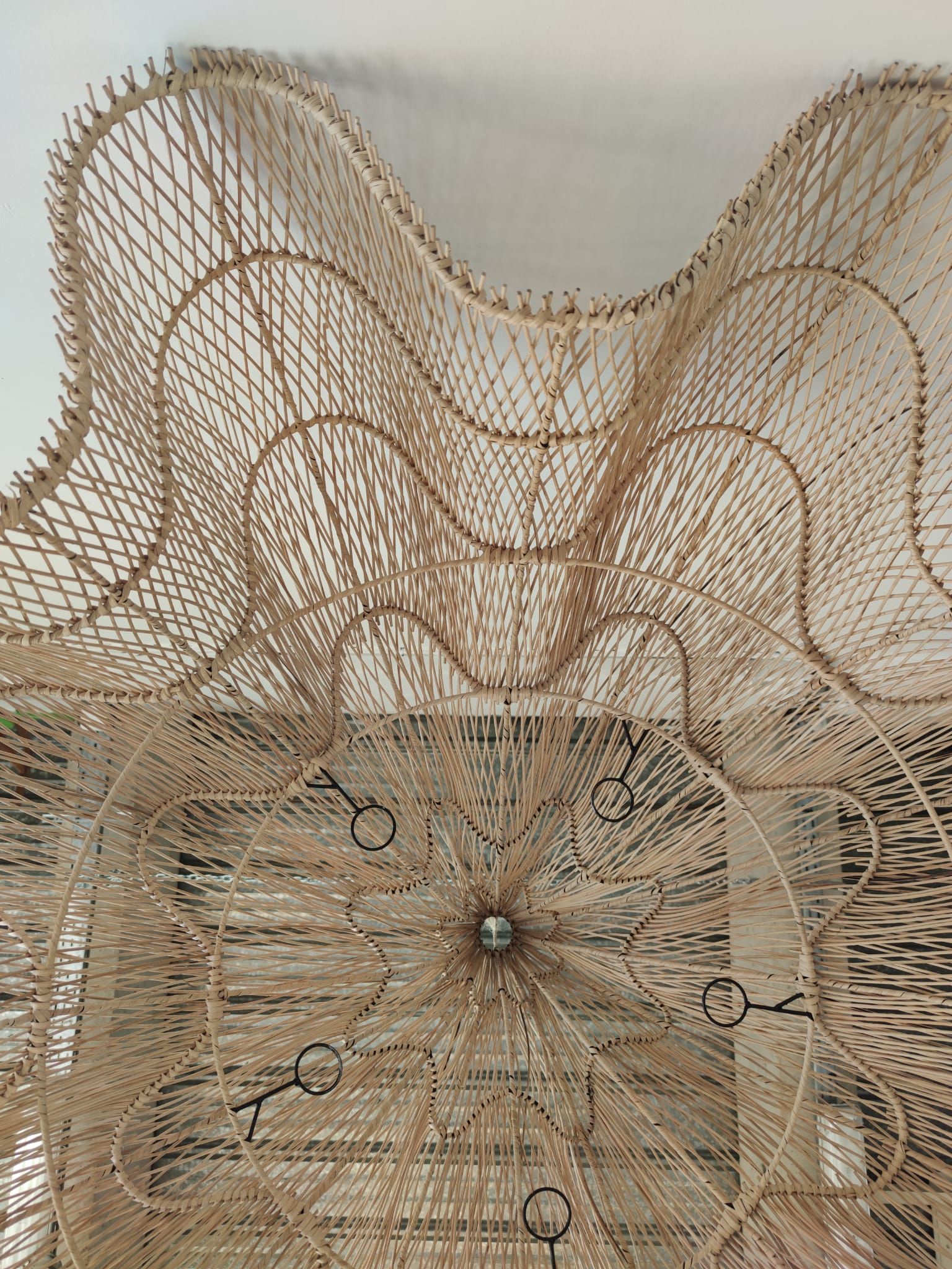Huge rattan suspension in the shape of a corolla H:1m; D: 1m50