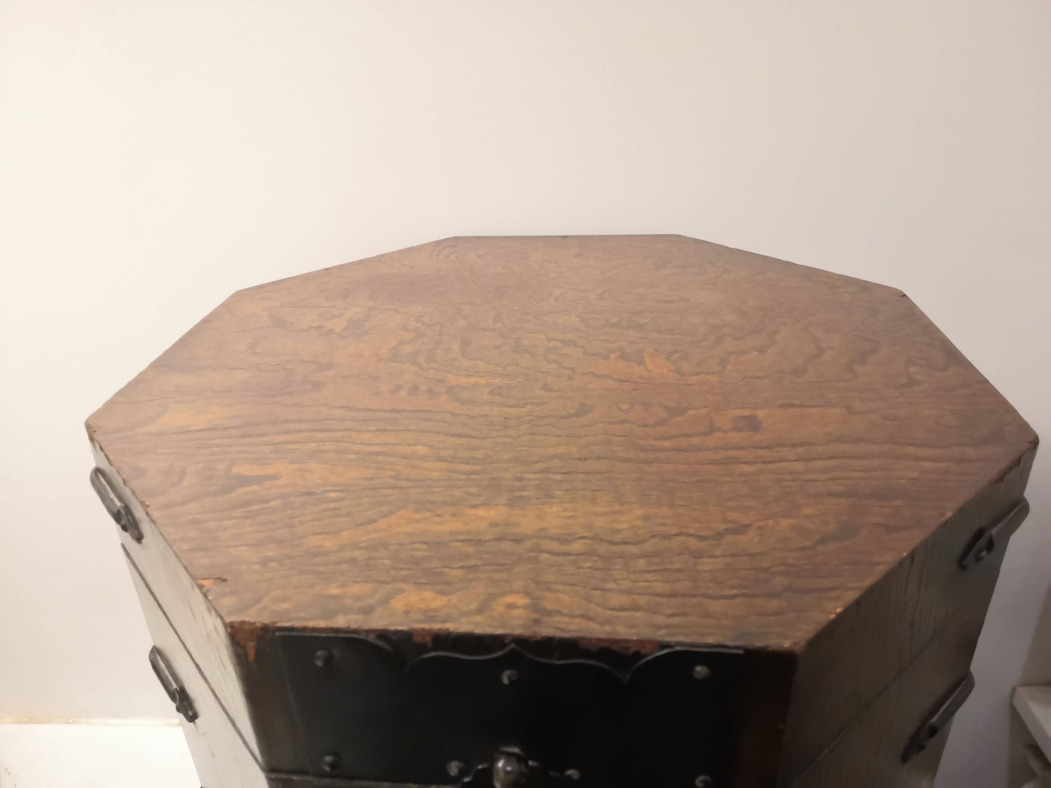 Octagonal wooden chest with metal ornaments from Asia