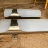 Brushed metal and ribbed opal plastic wall lights