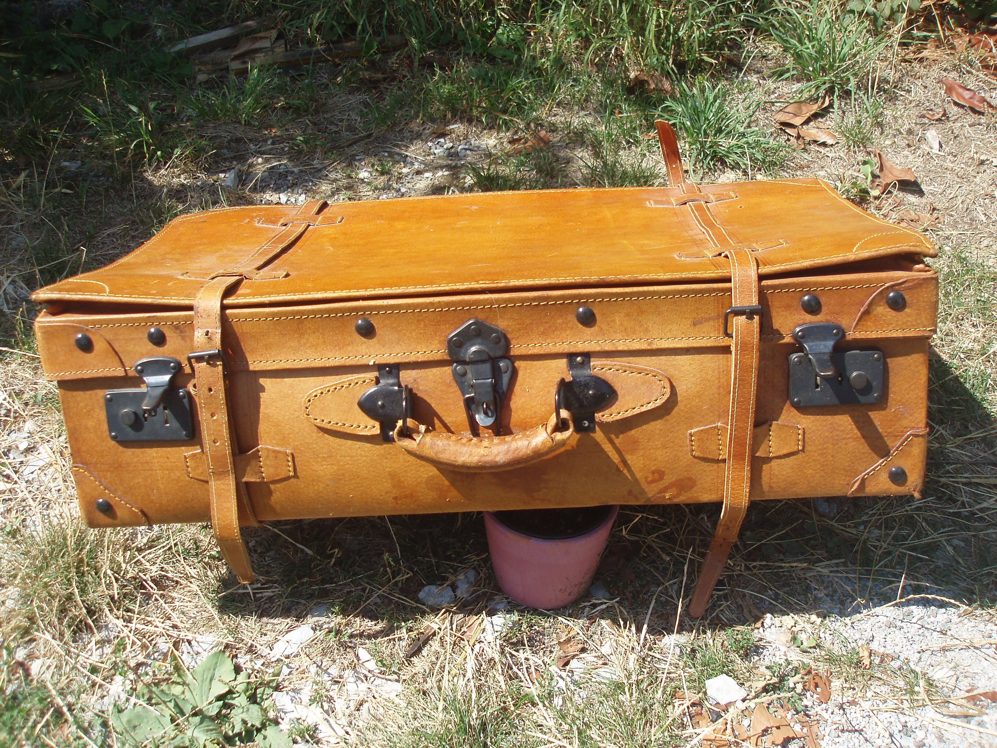 Old quality brown leather suitcase from the 60s