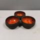 Beautiful bowl (composed of 3 bowls) with orange/red glaze inside