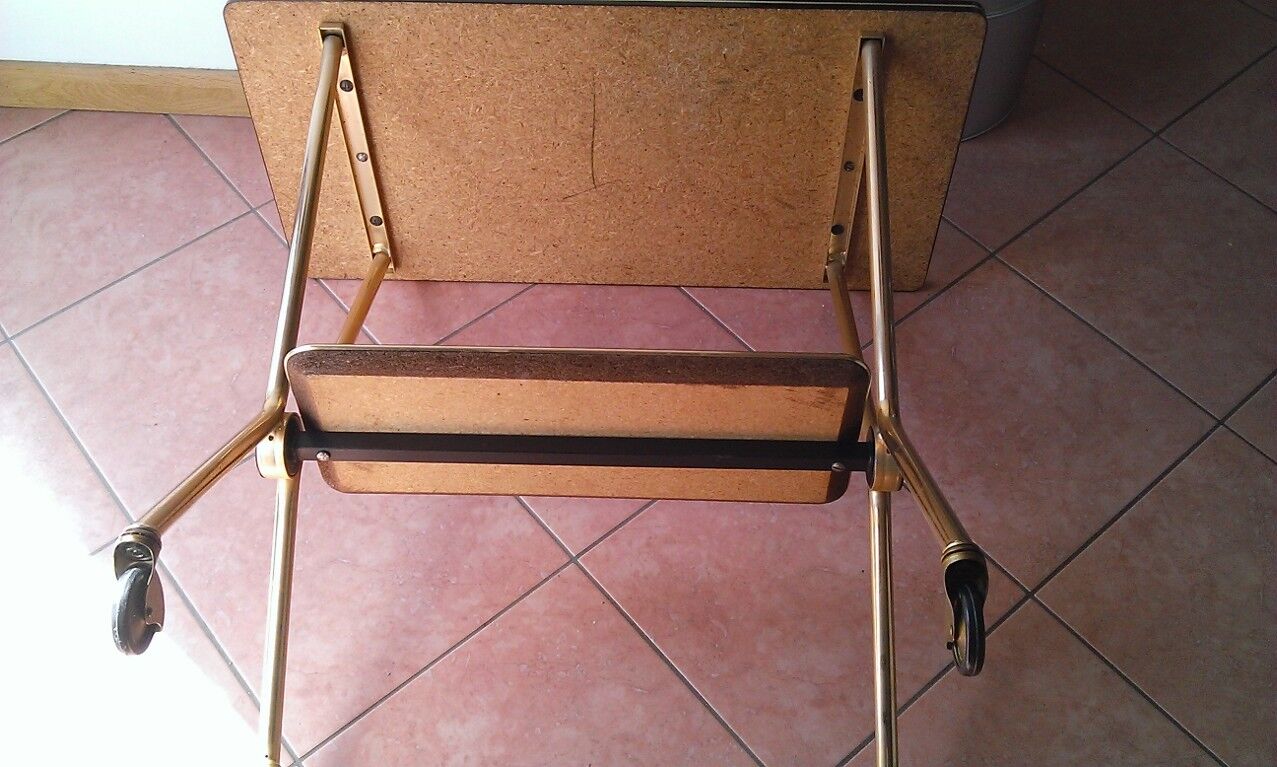 cosole serves feet X brass and chocolate