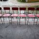 6 red and chrome Formica chairs