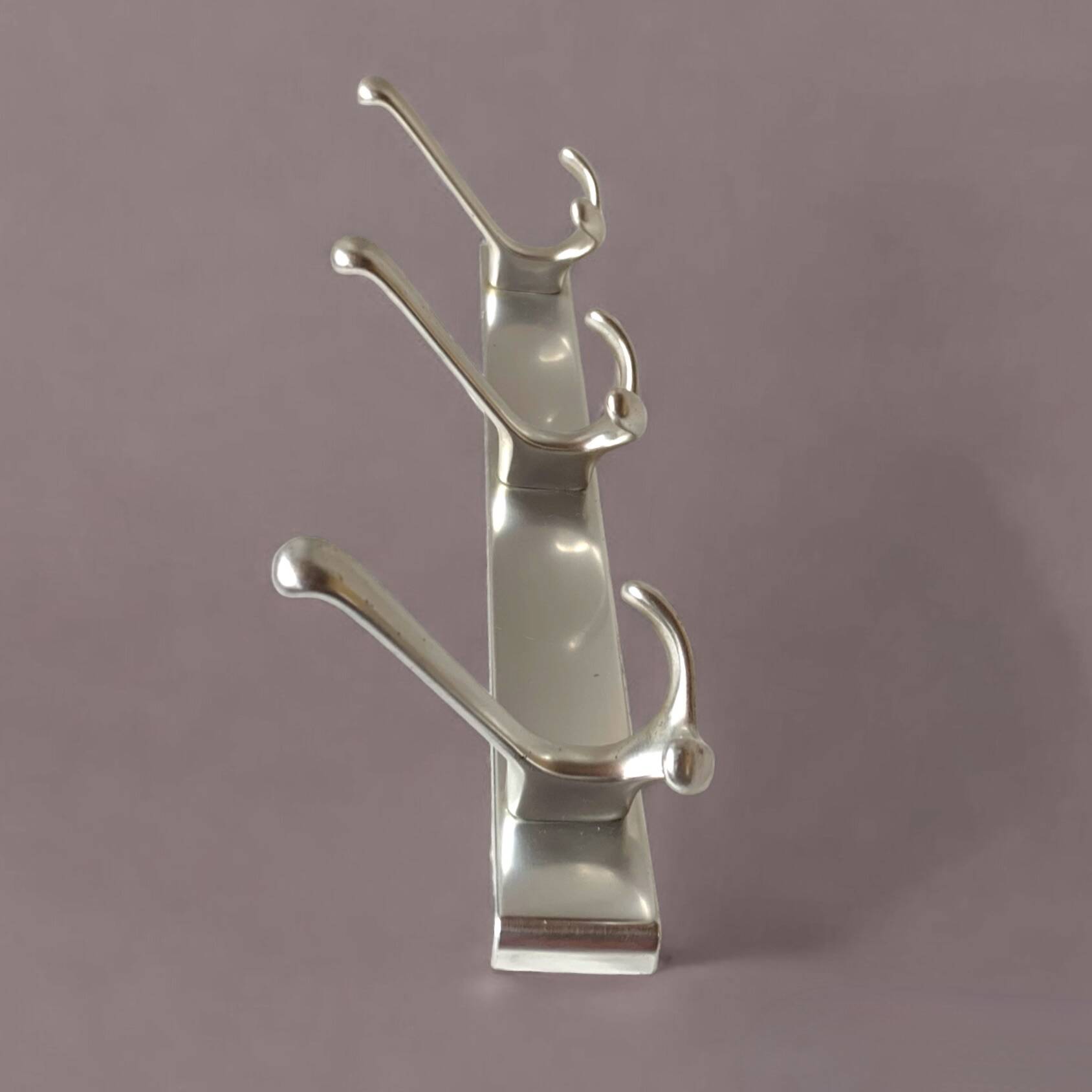 Vintage aluminum coat rack with three hooks