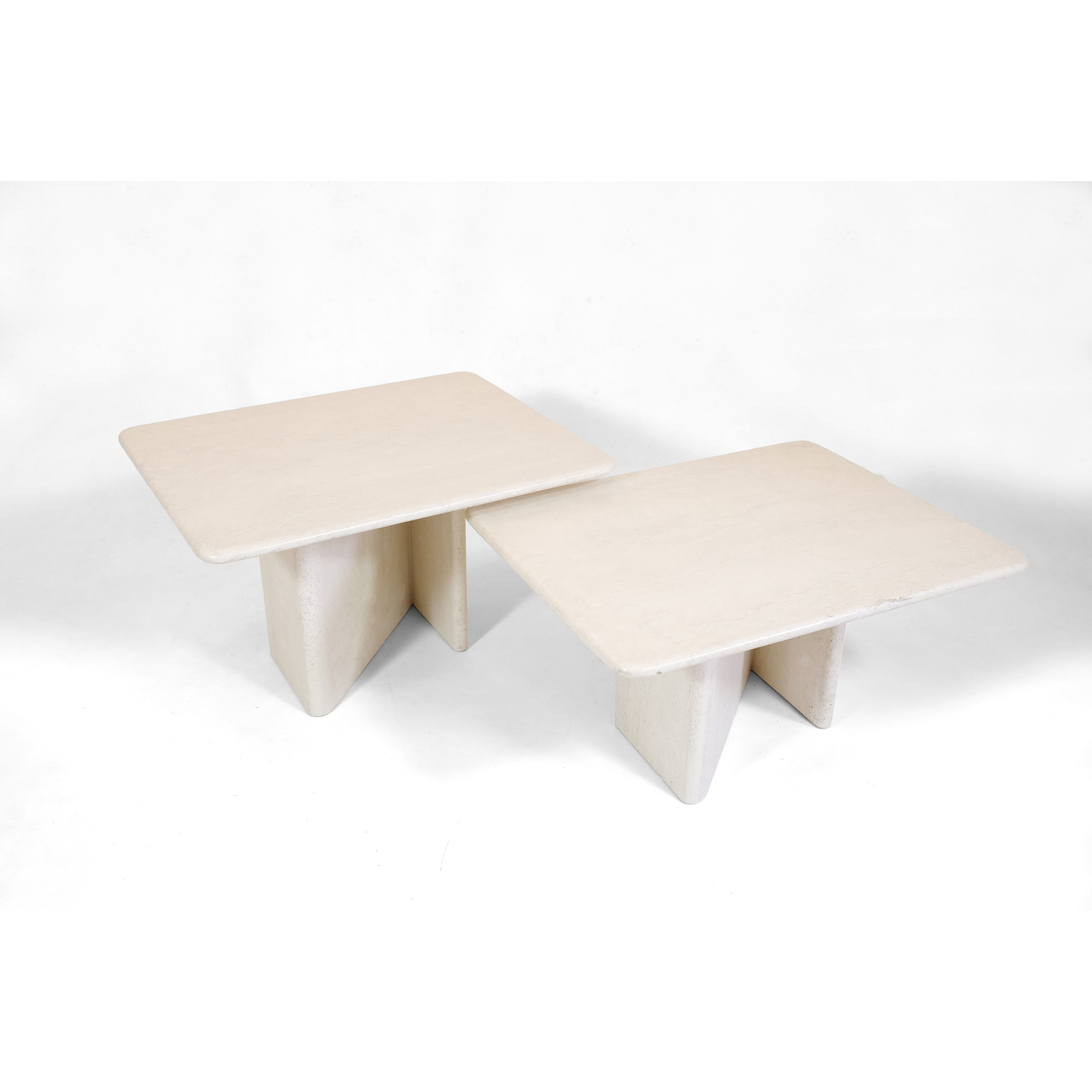 Pair of travertine trundle tables, Italy