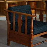 Art Nouveau, pair of oak lounge chairs, reupholstered in style fabric, 1920s.