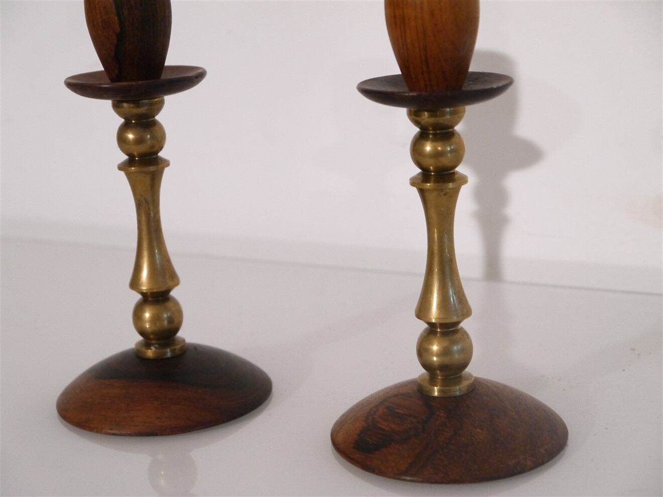 Pair of Scandinavian teak and brass candle holders
