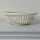 Woven earthenware basket