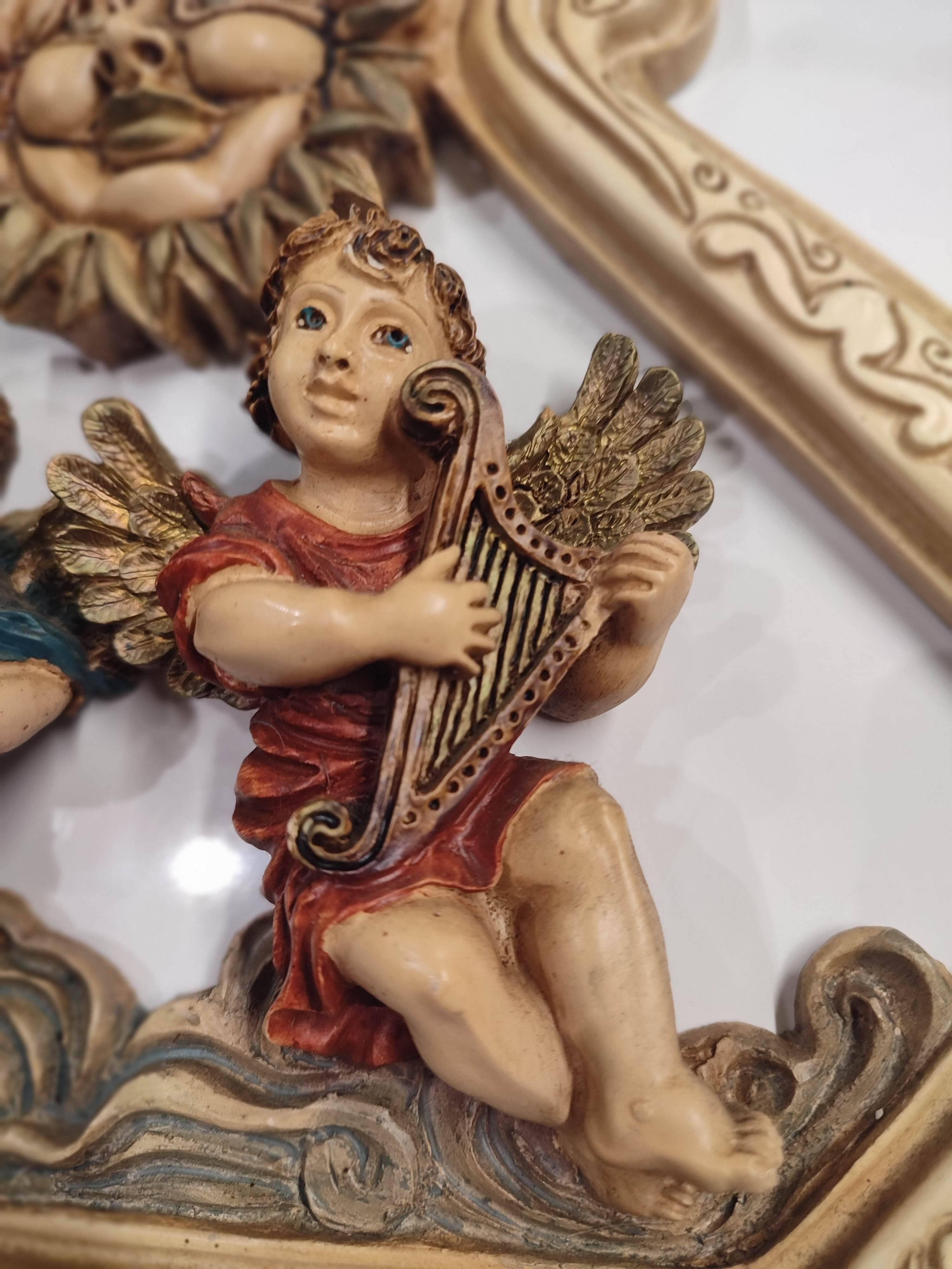 Very realistic angel figurines in resin, signed and handmade in Italy.