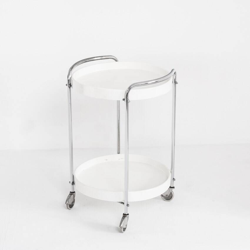 Vintage side table on casters. Chrome-plated iron and plastic. France, 1970s