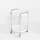 Vintage side table on casters. Chrome-plated iron and plastic. France, 1970s