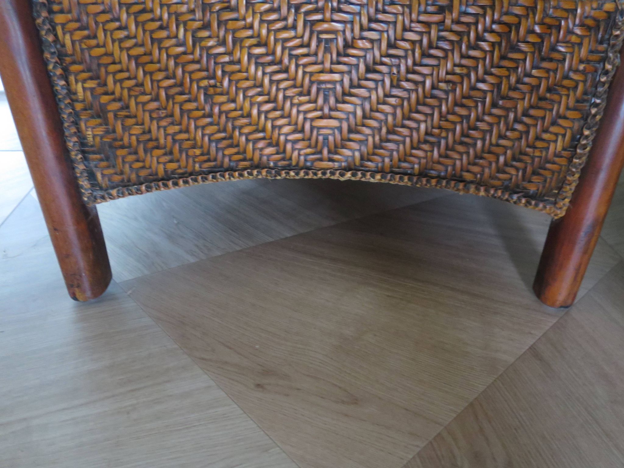 Woven rattan armchair and exotic wood in colonial style, 1980s.
