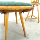 Vintage footrest stool with blue-green cushion