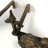 Lot of a pair of chenets and front of gilded bronze fireplace, nineteenth