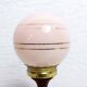 Turned wood and pink glass lamp