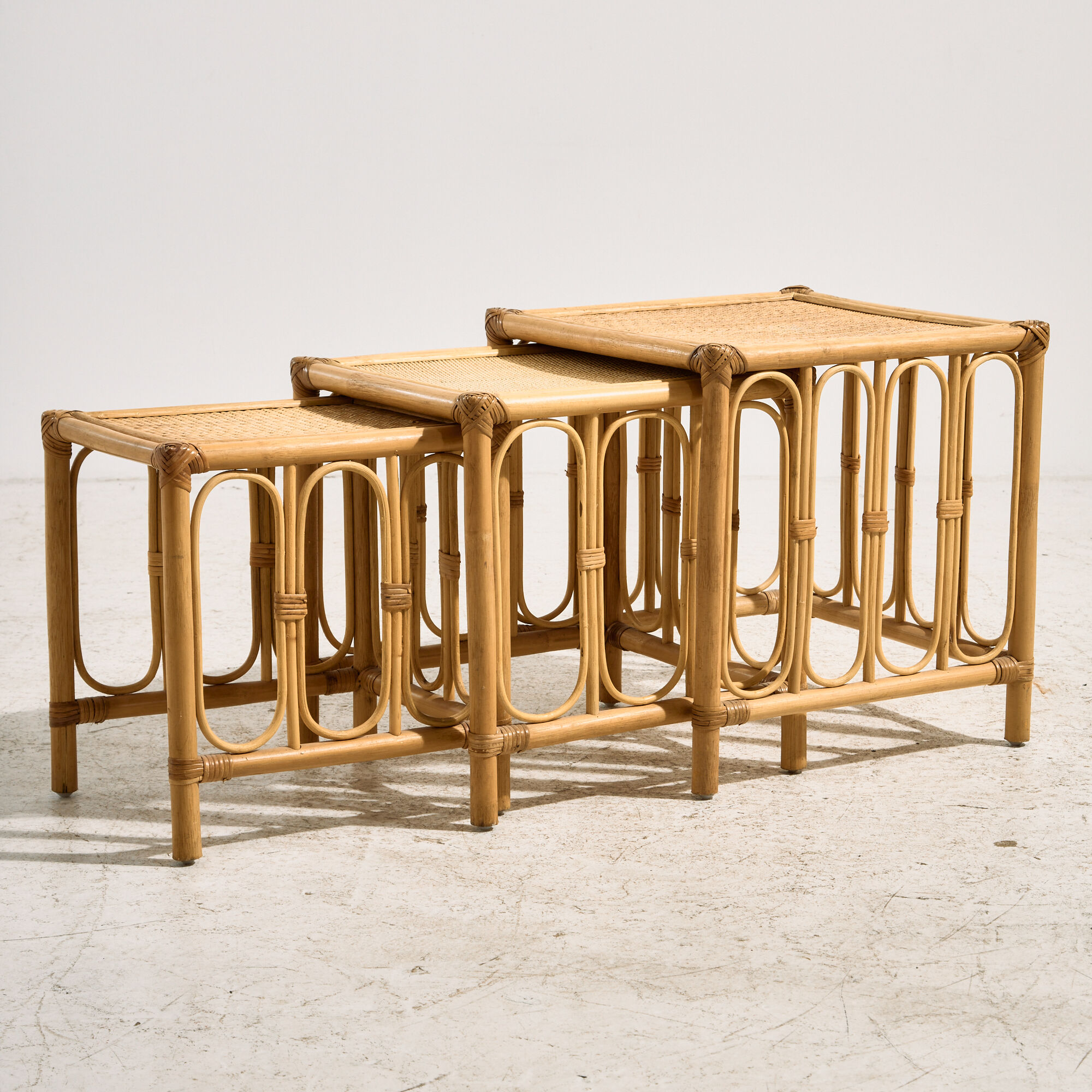 Nest of bamboo and rattan tables, set of 3.