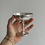 Silver-plated metal bowl on a stand