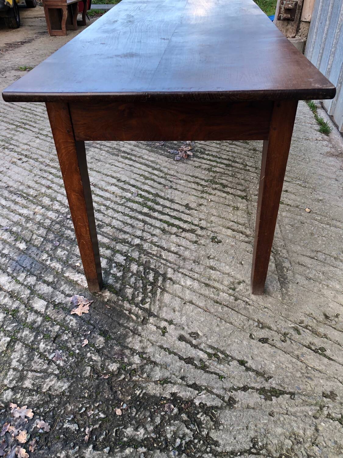 Antique chestnut farmhouse table with 3 drawers on the front.