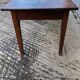 Antique chestnut farmhouse table with 3 drawers on the front.