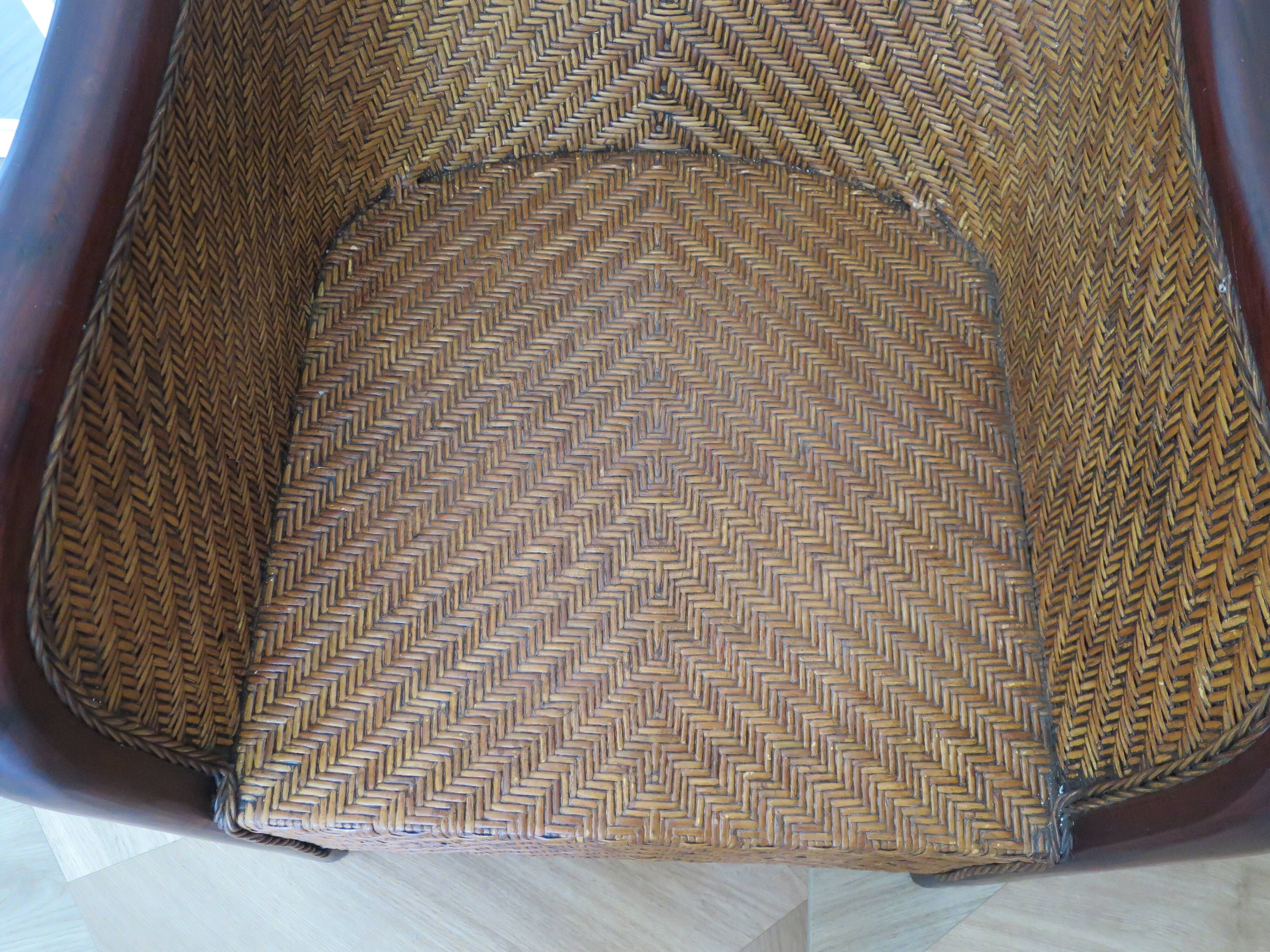 Colonial style armchair - woven rattan and exotic wood - vintage