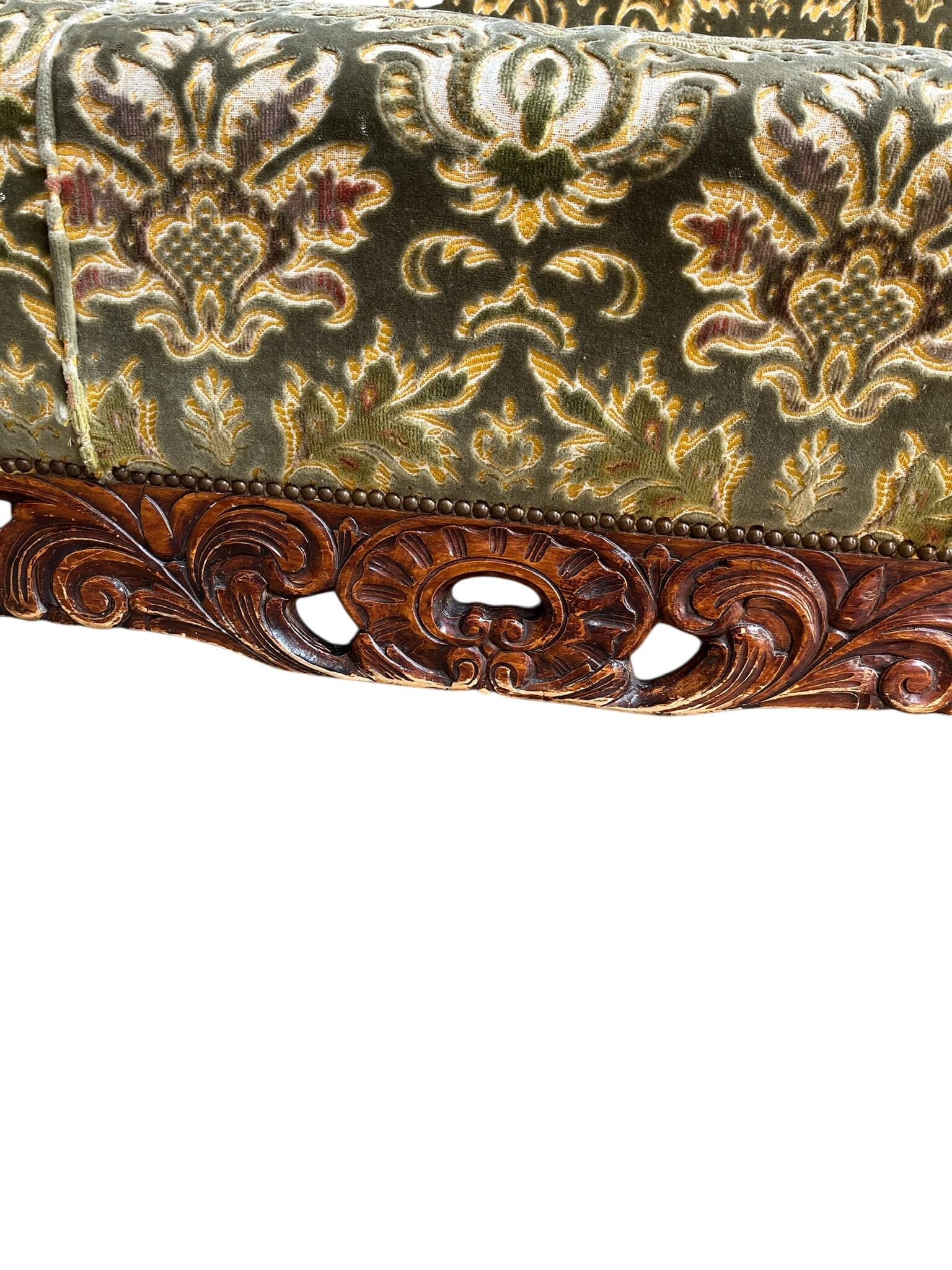 Vintage baroque chair with a rich floral pattern