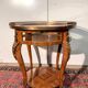 Display table in Louis XV style made of rosewood and violet wood.