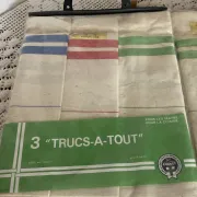 Three new multicoloured tea towels made of Cholet fabric, 100% cotton.