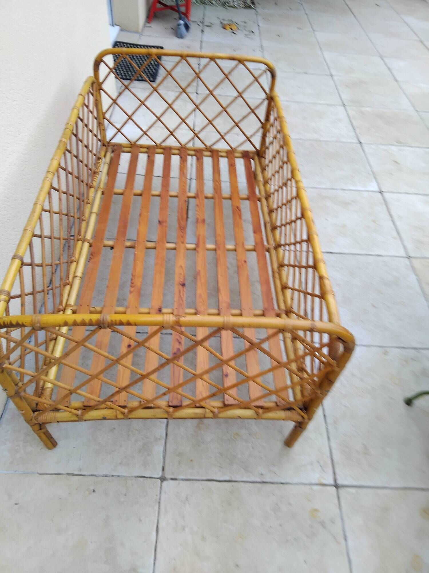Vintage rattan child or baby bed